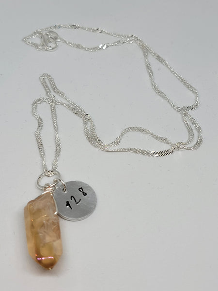 Quartz crystal pendant with angel number 128