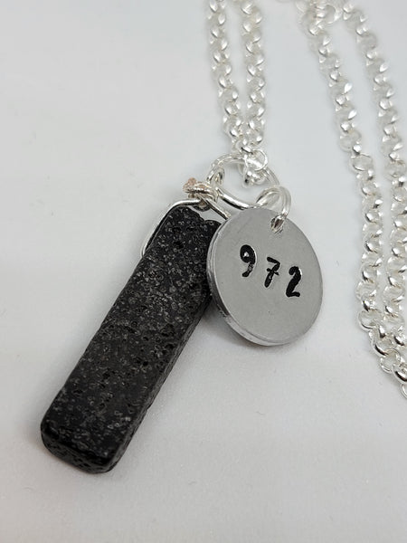 Lava semi precious gemstone pendant with Angel number 972 charm