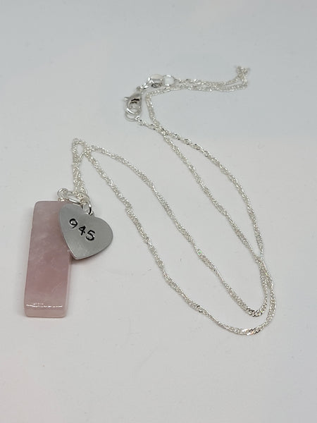 Rose Quartz pendant with Angel number 945.