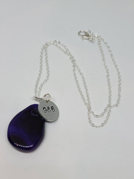 Purple Agate crystal with Angel number 986